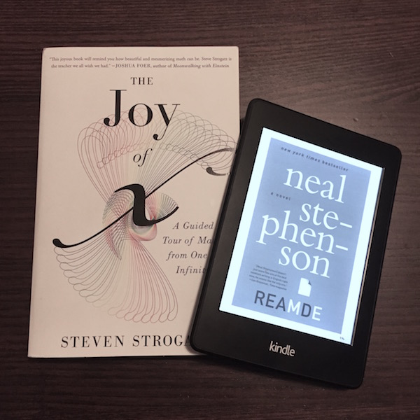 A book and a kindle, representing my reading.